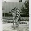 Fashion, World of - Models - Bathing Suits - Models wading in pool