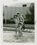 Fashion, World of - Models - Bathing Suits - Models wading in pool