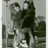 Fashion, World of - Models - Coats - Model holding child