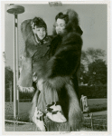Fashion, World of - Models - Coats - Model holding child