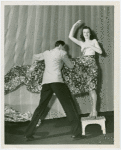 Fashion, World of - Models - Dressmaking - Man fits dress to model