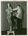 Fashion, World of - Models - Dressmaking - Man fits dress to model