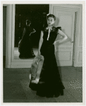 Fashion, World of - Models - Gowns - Model posing in ""Drama after Dark"" gown