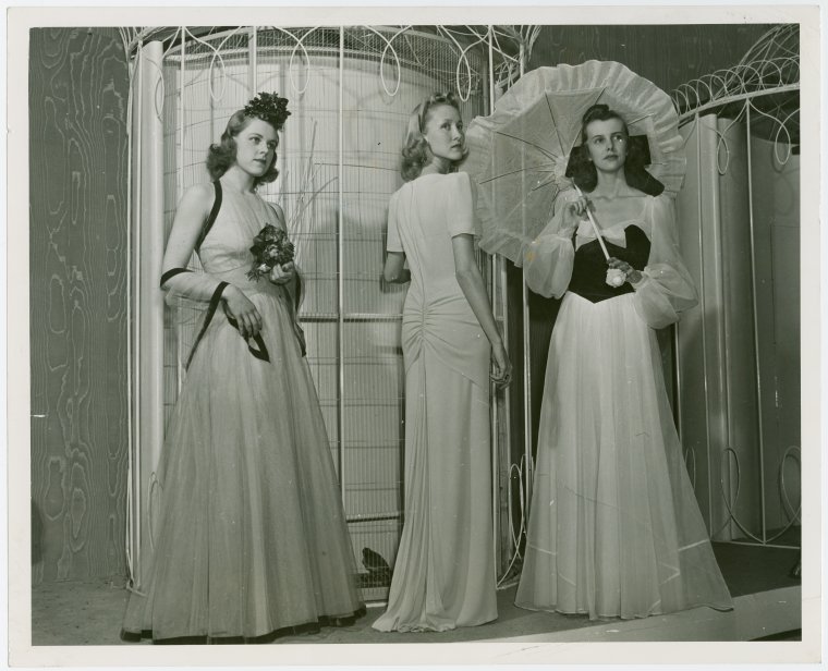 Fashion, World of - Models - Gowns - Three models standing by birdcage ...
