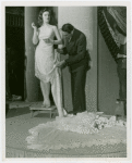 Fashion, World of - Models - Gowns - Model being fitted