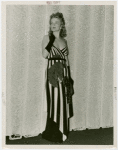 Fashion, World of - Models - Gowns - Model in front of curtain