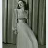 Fashion, World of - Models - Gowns - Model sitting on stage