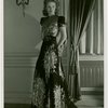 Fashion, World of - Models - Gowns - Model standing by window