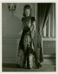 Fashion, World of - Models - Gowns - Model standing by window