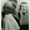 Fashion, World of - Models - Hairstyles - Model looking into mirror