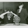 Fashion, World of - Models - Hairstyles - Model fixing hair