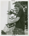 Fashion, World of - Models - Sport - Model putting box into purse