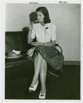 Fashion, World of - Models - Sport - Model smoking a cigarette