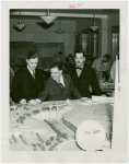Federal (United States Government) Exhibit - Fiorello LaGuardia, Grover Whalen and Henry A. Wallace (U.S. Secretary of Agriculture) look at model