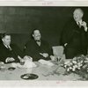 Federal (United States Government) Exhibit - Grover Whalen, Sam D. McReynolds and Henry A. Wallace (U.S. Secretary of Agriculture) at luncheon