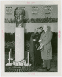 Federal (United States Government) Exhibit - Officials look at bust