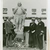 Federal (United States Government) Exhibit - Officials look at statue