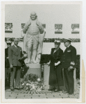 Federal (United States Government) Exhibit - Officials look at statue