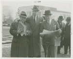 Federal Housing Administration - Harvey Gibson and group looking at plan