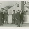 Federal Housing Administration - Group in front of FHA home and sign
