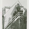Federal Housing Administration - Houses - Group with Grover Whalen on stairs of house
