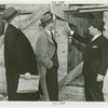 Federal Housing Administration - Houses - Construction - Group inspects house