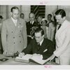 Finland Participation - Hjalmar Procope (ex-president, League of Nations) signs book