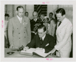 Finland Participation - Hjalmar Procope (ex-president, League of Nations) signs book
