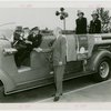 Firemen - Group on fire engine