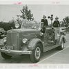 Firemen - Group on fire engine