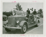 Firemen - Group on fire engine