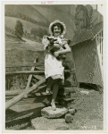 Firestone - Building - Farm - Woman with lamb