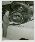 Firestone - Firestone Brothers - Inspecting synthetic rubber tire