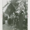 Flags - Man addressing group for Flag of the Day celebration of New York Athletic Club flag