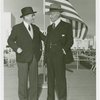 Flags - Two men in front of American flag