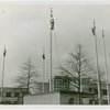 Flags - Workers painting flagpoles
