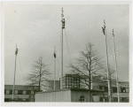 Flags - Workers painting flagpoles