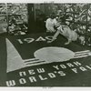 Flags - Man measuring letters on New York World's Fair flag