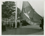 Flags - Miss Treasure Island with Harvey Gibson raising San Francisco's Golden Gate International Exposition flag