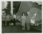 Flags - Miss Treasure Island with Harvey Gibson and the San Francisco's Golden Gate International Exposition flag