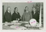 Florida Participation - Earl W. Brown, Grover Whalen with others at Fair model