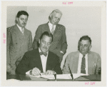 Florida Participation - Brown, Earl W. - Signing contract with Grover Whalen