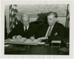 Florida Participation - Brown, Earl W. - Signing contract with Harvey Gibson