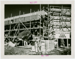 Food - Building - Construction - Workers applying concrete