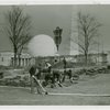 Ford - Workers cutting sod with Trylon and Perisphere in background