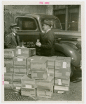 Ford - Men with boxes of special ticket books