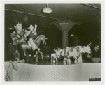Ford - Exhibits - Cycle of Production - Woman with cowboy and cow figurines