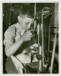 Ford - Exhibits - Edison Institute - Boy demonstrating drill press