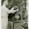 Ford - Exhibits - Synthetic Fiber - Chemist pouring solvent for soybean oil extraction