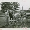Ford - Ford, Edsel - On Ford tractor with Grover Whalen observing